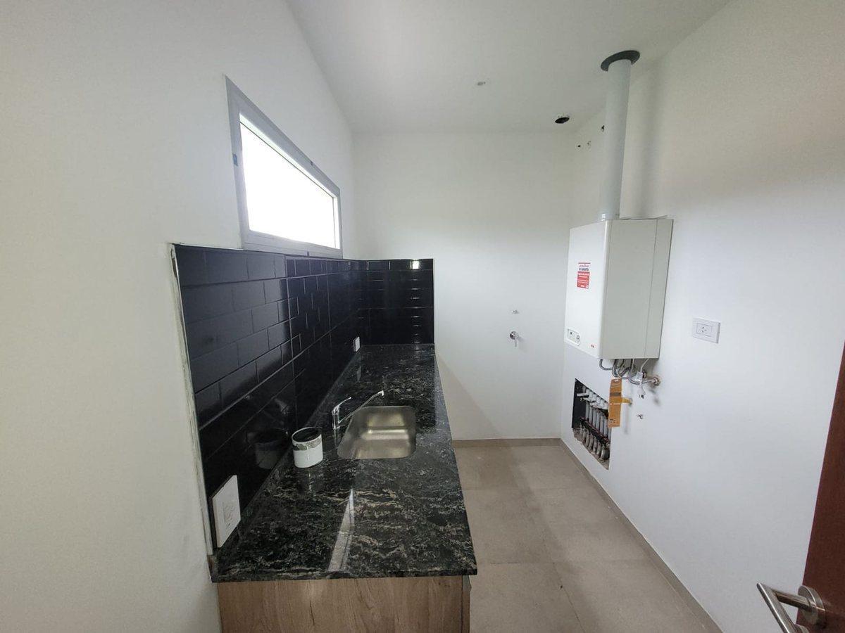 Foto de CASA 3 DORMITORIOS 2 BAÑOS B° GARDENS, imagen 3