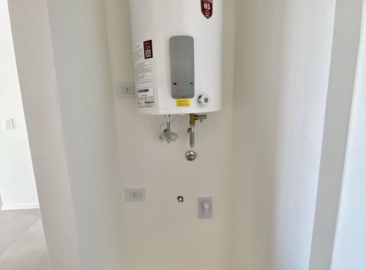 Departamento de 3 ambientes con cochera a estrenar 3