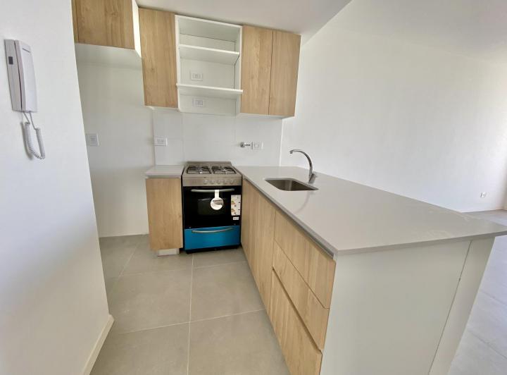 Departamento de 3 ambientes con cochera a estrenar 4