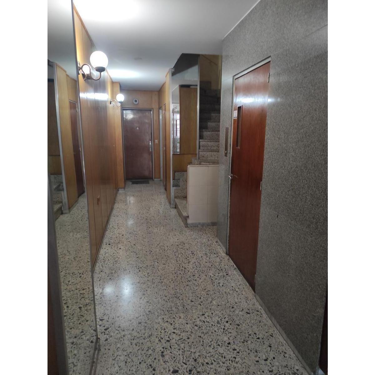Living comedor piso de parquet departamento venta Mitre 284 Rosario