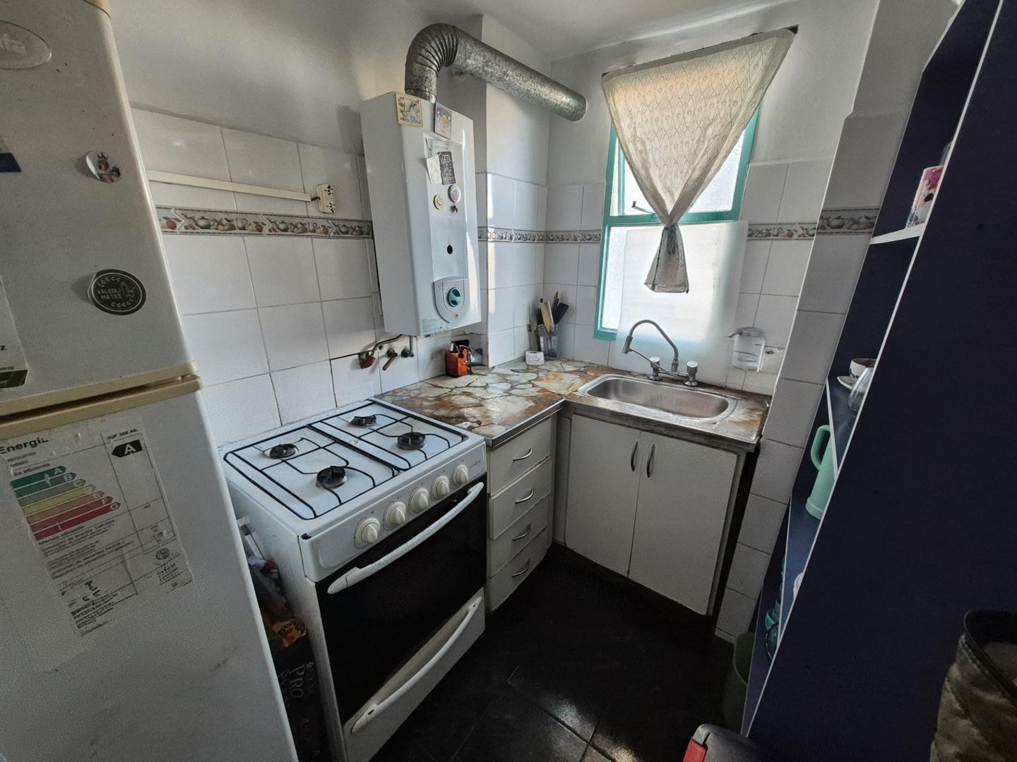 Foto de VENTA DEPARTAMENTO DE TRES AMBIENTES EN VILLA DOMINICO, imagen 4