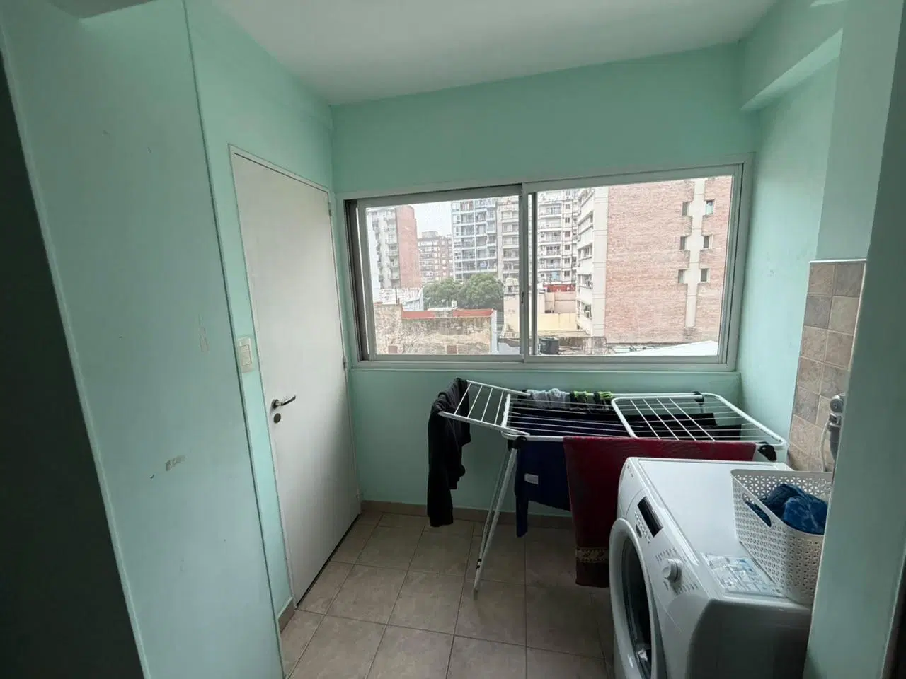 Departamento de tres dormitorios con cochera en venta 5