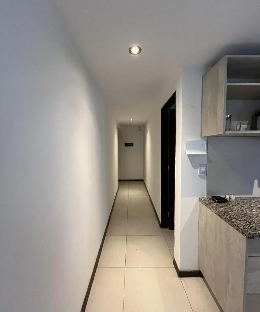Departamento de dos dormitorios con cochera en alquiler en Condominios del alto III 3