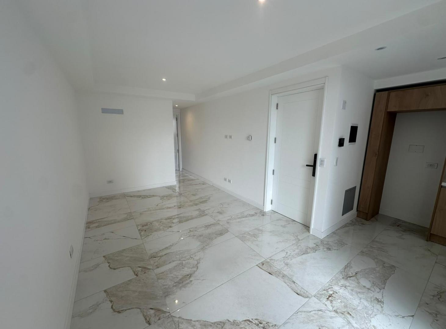 Foto de Alquiler departamento 2 ambientes con cochera en Los Troncos, imagen 2