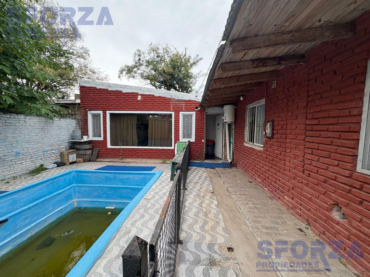 Foto de Venta para inversión o vivienda multifamiliar, ideal Renta. Casa + 5, imagen 1
