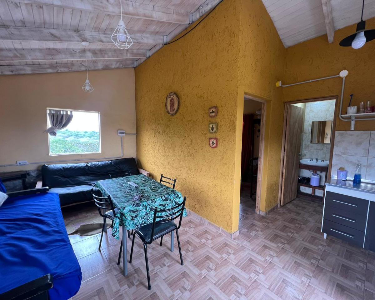 VENTA DE CASA MAS CABAÑA CON PILETA EN COSQUIN VISTA POSTAL A LAS SIERRAS   REF: 1921