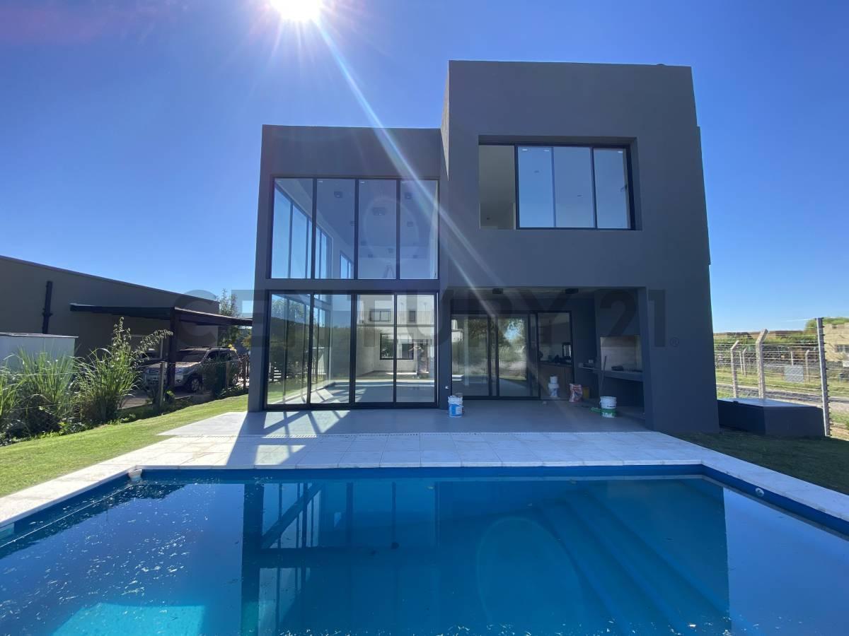 Foto de CASA CON PILETA SALA DE AUDIO/CINE EN SAN RAMON, imagen 1