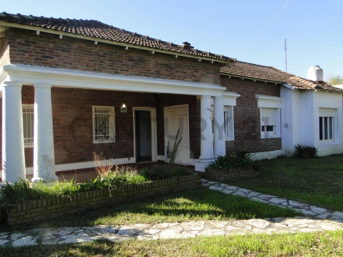 Foto de VENTA CASA 4 AMBIENTES+ DEPENDENCIA EN LONGCHAMPS. PARQUE ARBOLADO Y, imagen 1