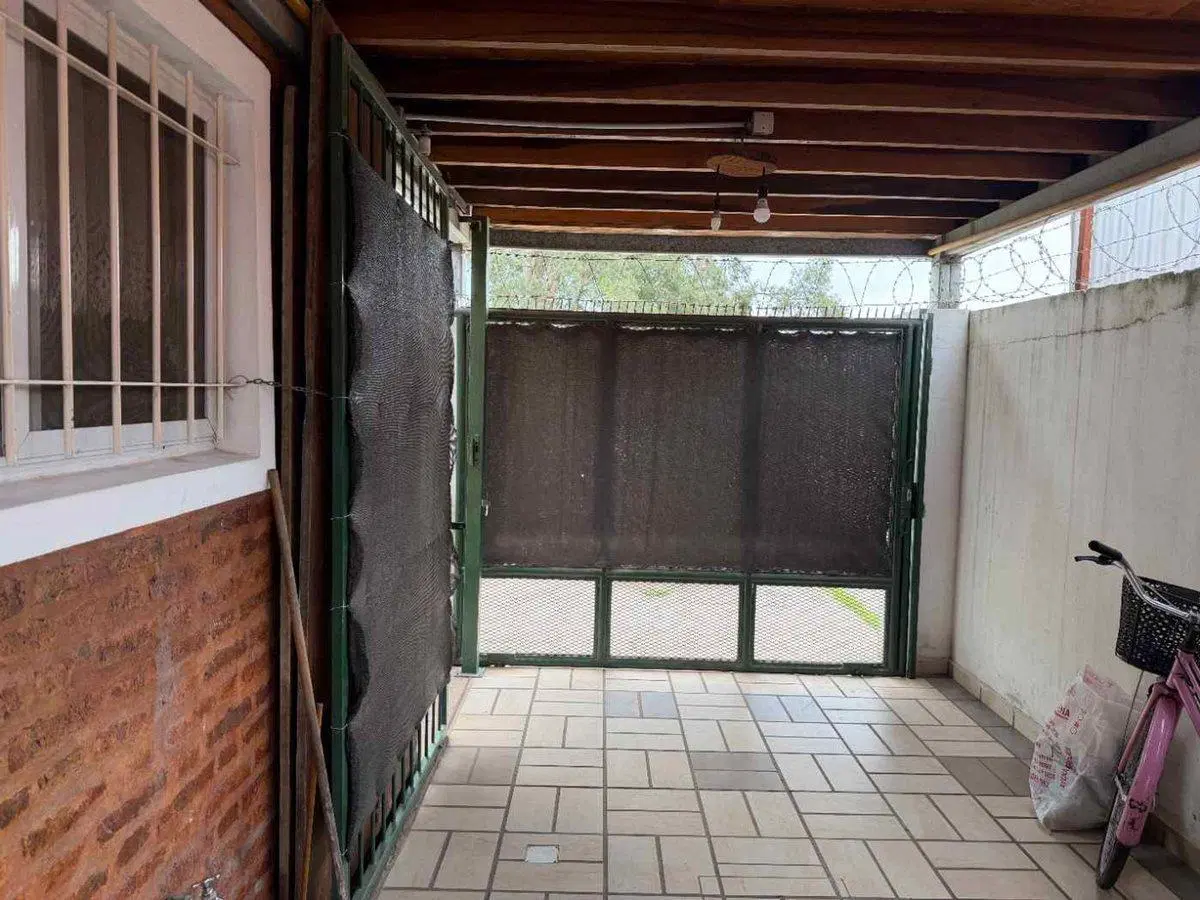 CASA EN VENTA 2 DORMITORIOS, COCHERA FISHERTON 5
