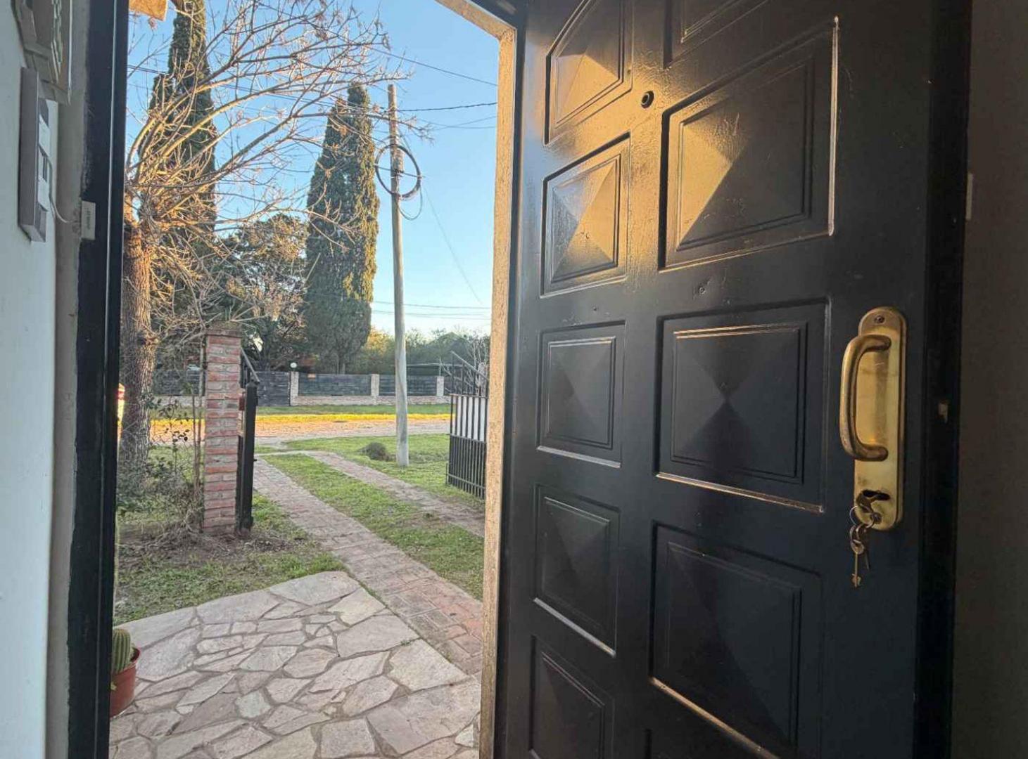 Foto de CASA CON QUINCHO Y PILETA A LA VENTA EN ROLDAN, imagen 5