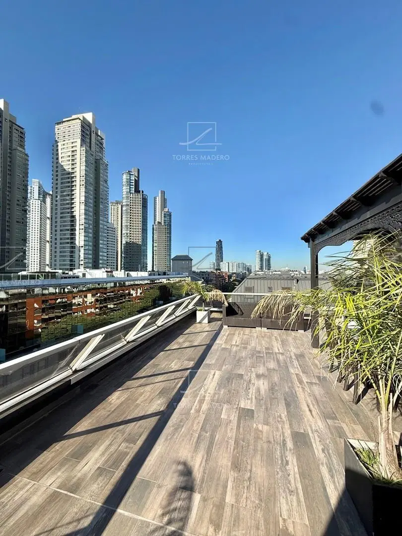 Exclusivo duplex con terraza y parrilla privada amoblado de dos dormitorios en alquiler 4