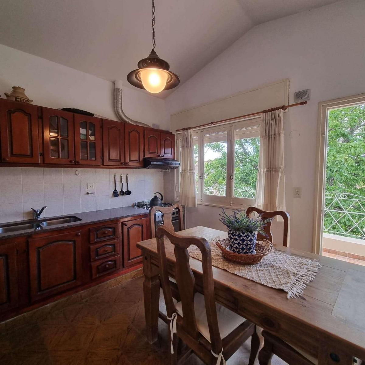 Casa 2 Dorm. con un Departamento en Planta Baja - Pileta y Quincho 1