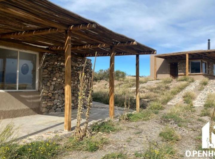 Inmobiliaria OPENHOUSE vende TERRENO con casa y quincho en Barrio Atamisque. 4