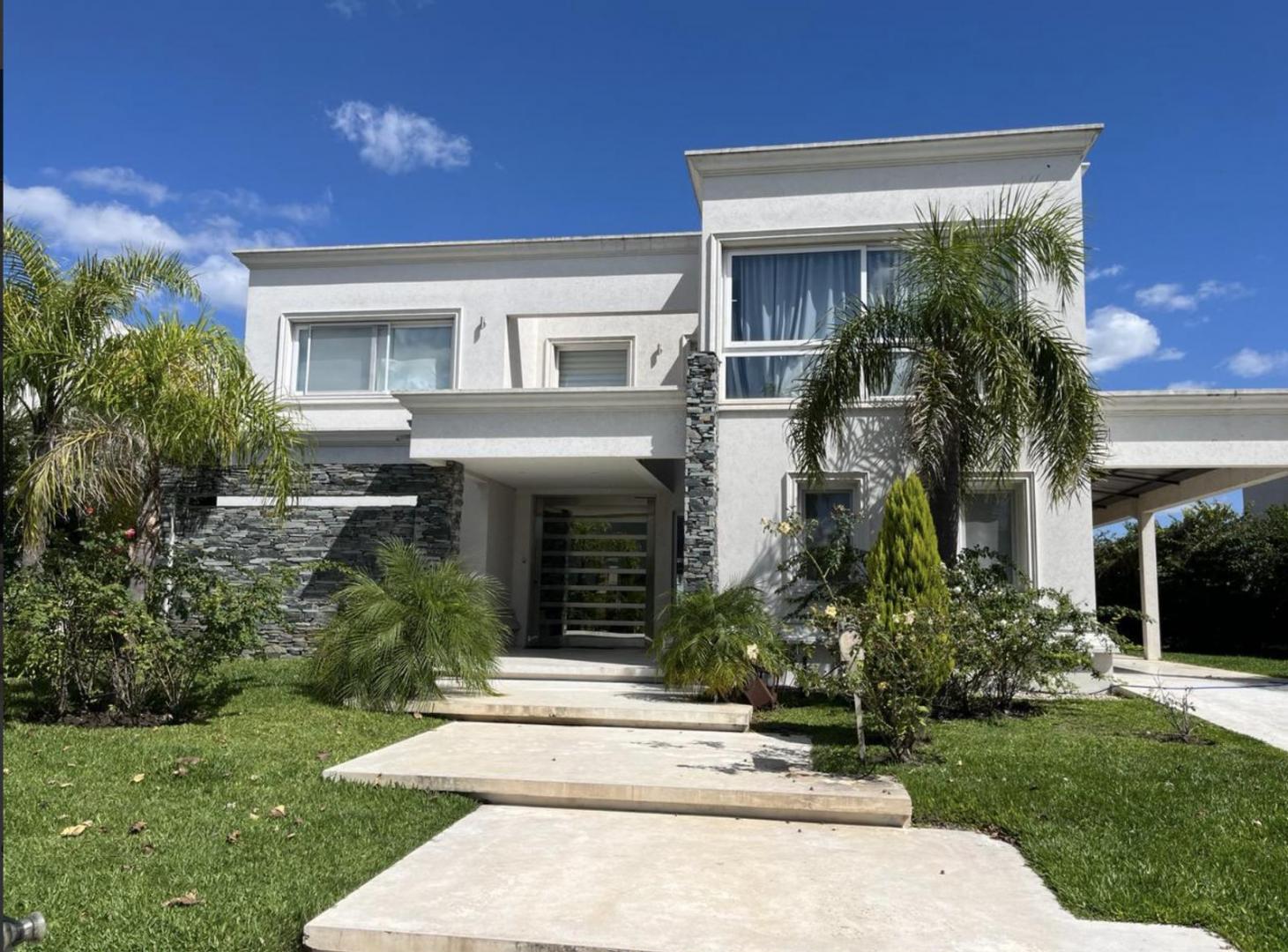 Foto de Casa en venta a la laguna en Los Alisos, Nordelta., imagen 1