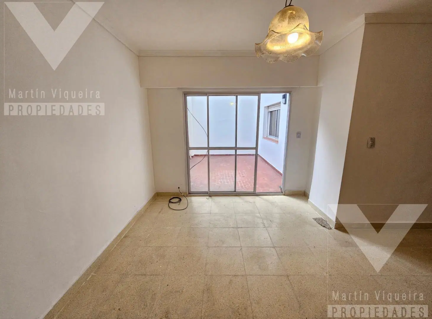 Alquiler de Tres ambientes en planta baja con dos patios. Púan y entre Ramon Falcon y Alberdi 2