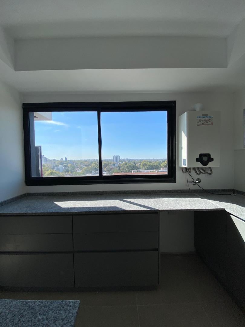 PRECIOSO DEPARTAMENTO 3 AMBIENTES CON COCHERA EN VENTA