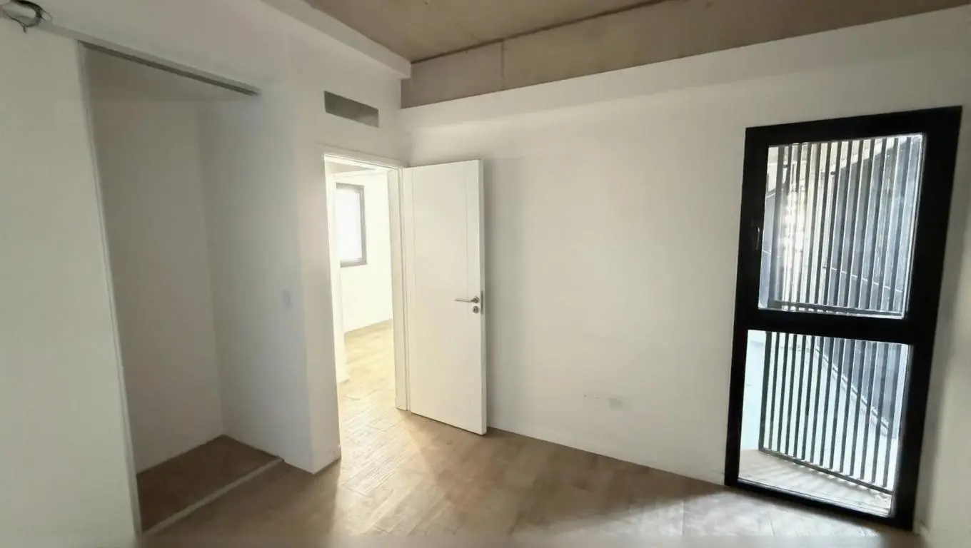 Departamento de dos ambientes con cochera a estrenar 4