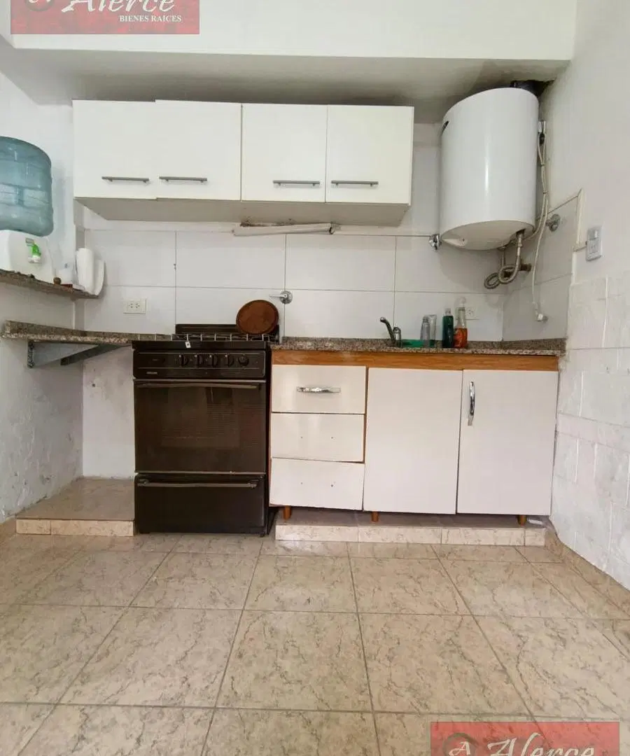 PROPIEDAD EN LOTE PROPIO CON AMPLIO ESPACIO DESCUBIERTO Y MONOAMBIENTE COMPLETO 2