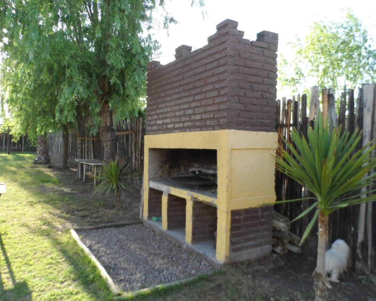 Casa en Venta Gran Parquizado Dos Dorm. y Baño Completo 4