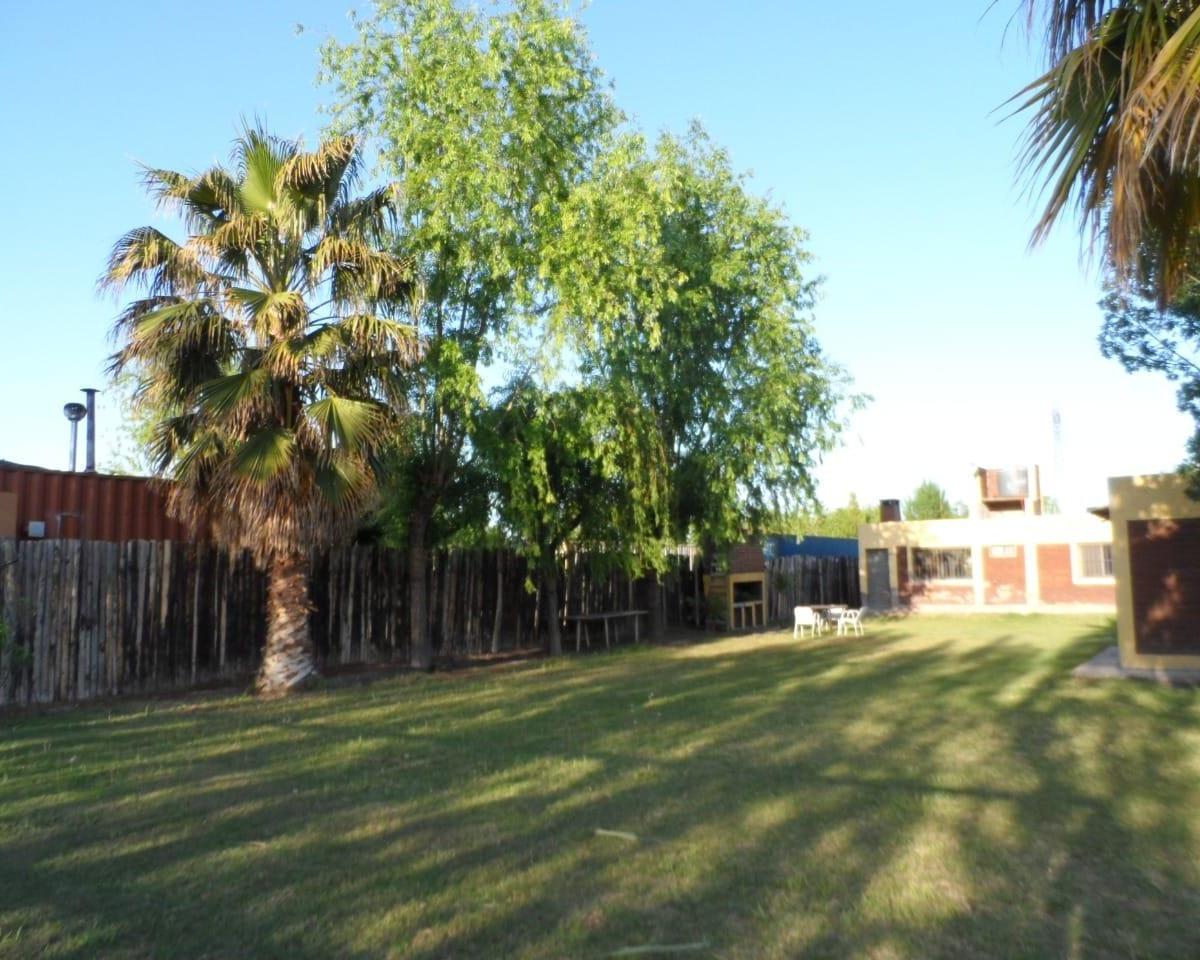 Casa en Venta Gran Parquizado Dos Dorm. y Baño Completo 5
