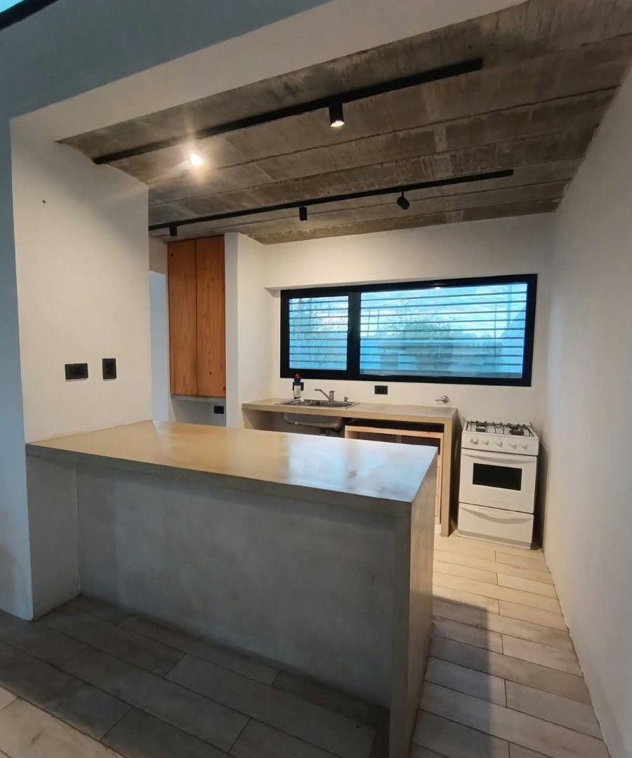 Foto de 47/149 Moderna casa de 1 dormitorio con fondo verde, imagen 5