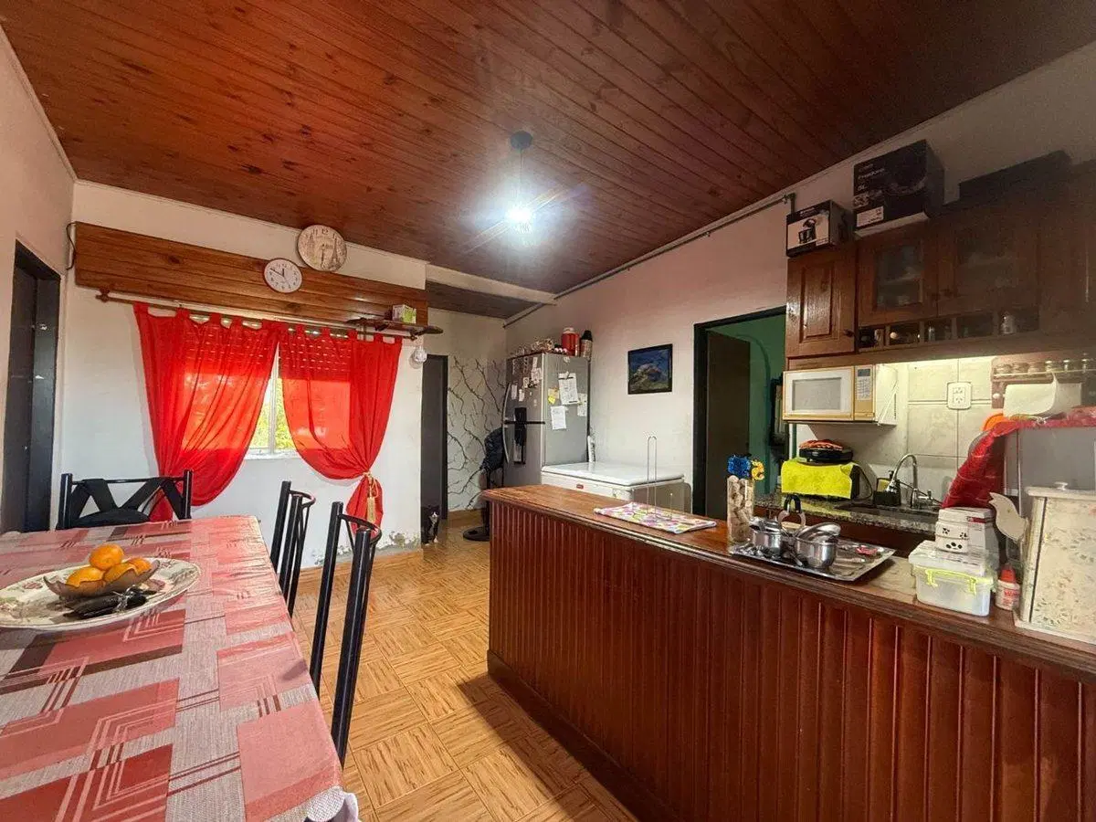 VENTA CASA DOS FAMILIAS WILDE JARDIN 8