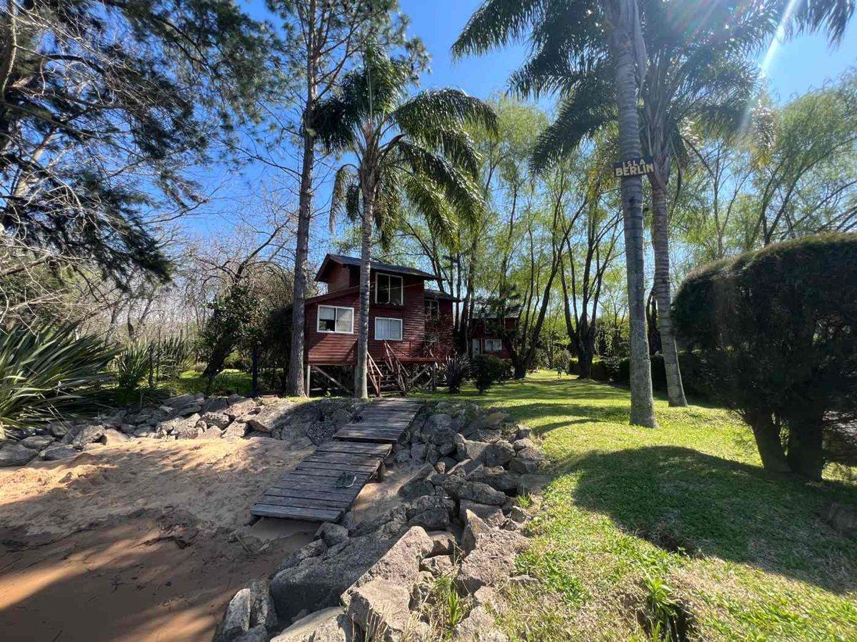 Foto de VENTA DE TERRENO CON 3 CABAÑAS CANAL ARIAS DELTA, imagen 1