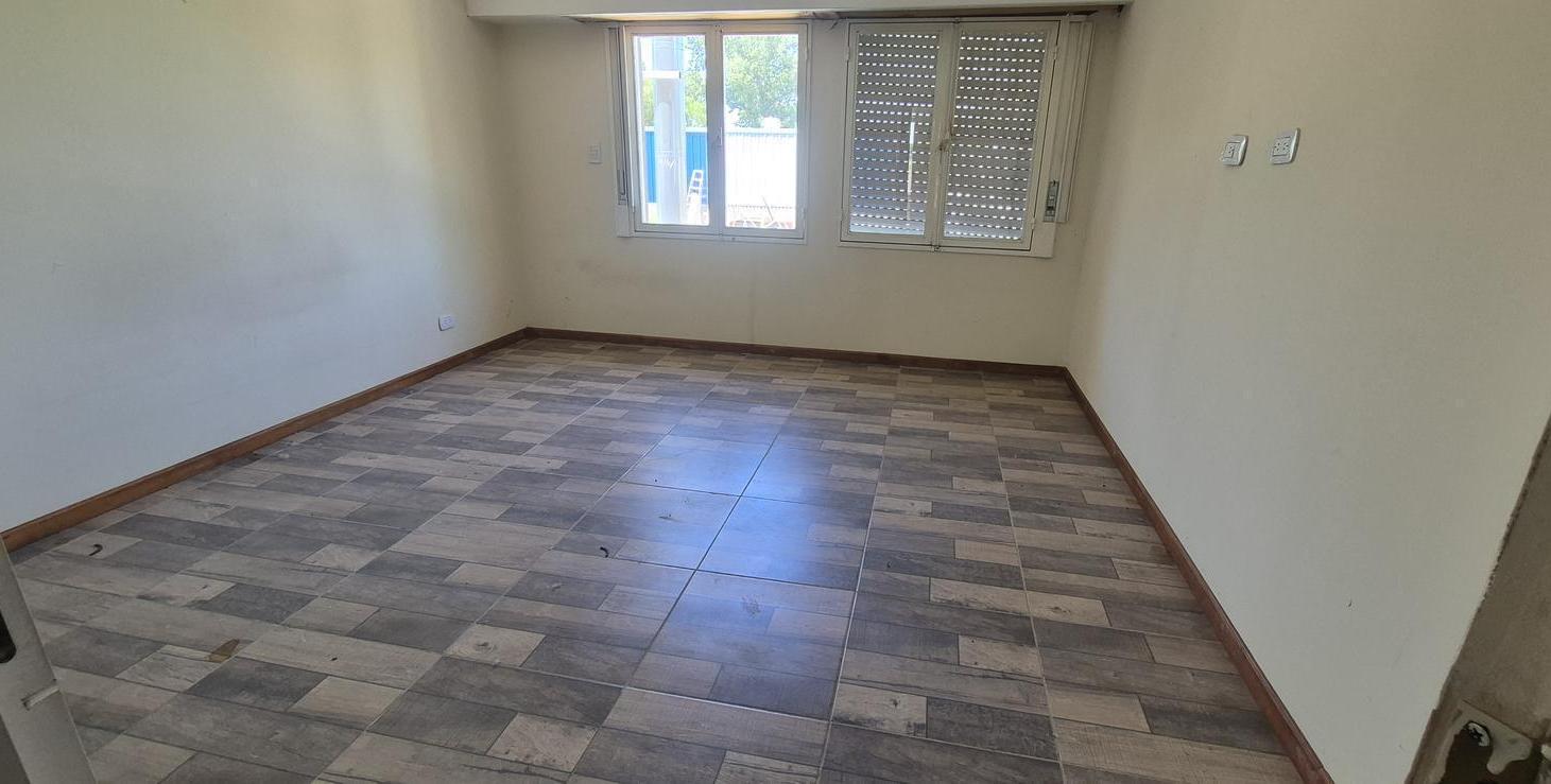 Foto de Departamento en Pueblo Esther - Patio - Parrillero, imagen 1