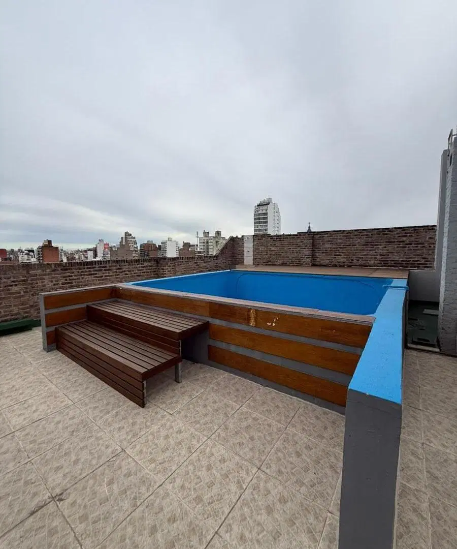 Departamento monoambiente con balcon al frente y amenities 4