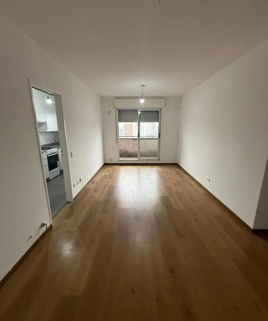 Departamento dos dormitorios con cochera en planta baja 4