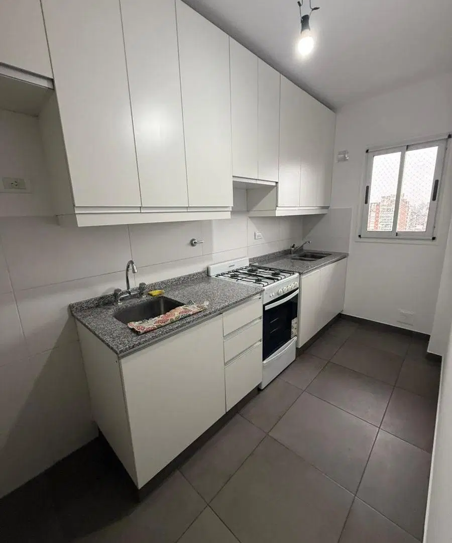 Departamento dos dormitorios con cochera en planta baja 2
