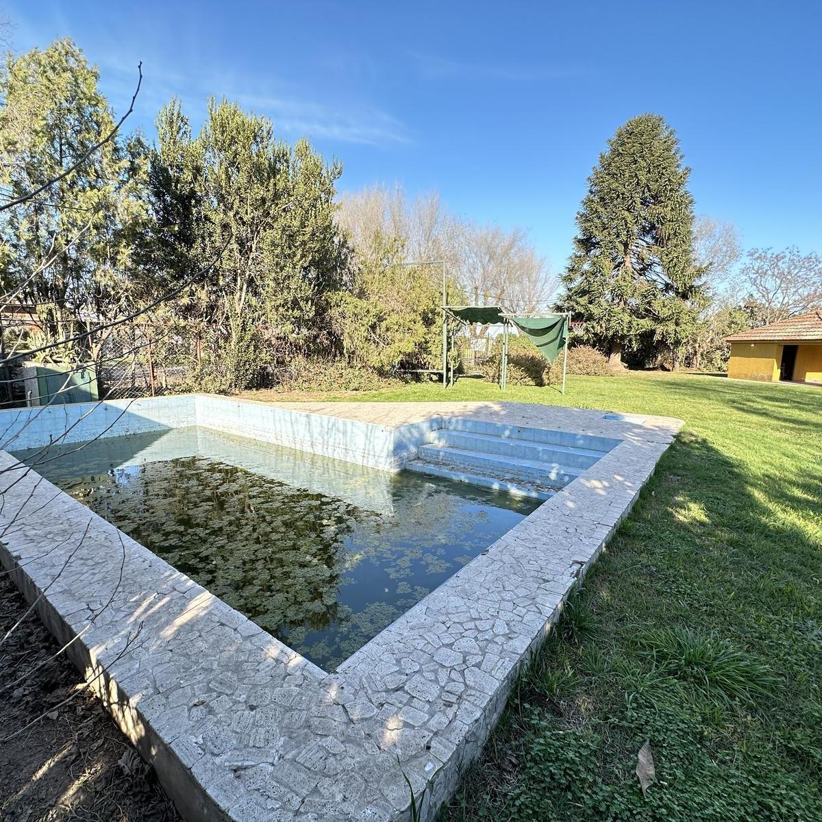 Gran Terreno con Casa y Piscina en Pueblo Esther 5