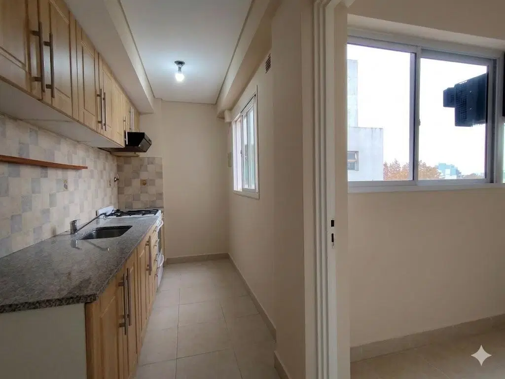 Departamento 3 amientes con terraza propia y cochera 5