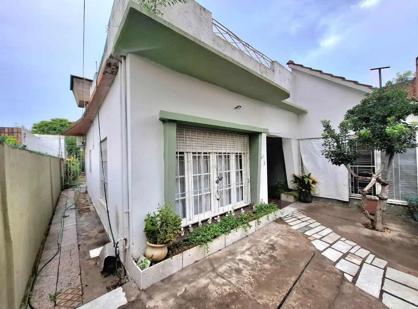 CASA 3 AMBIENTES VENTA TEMPERLEY JARDIN Y COCHERA 4