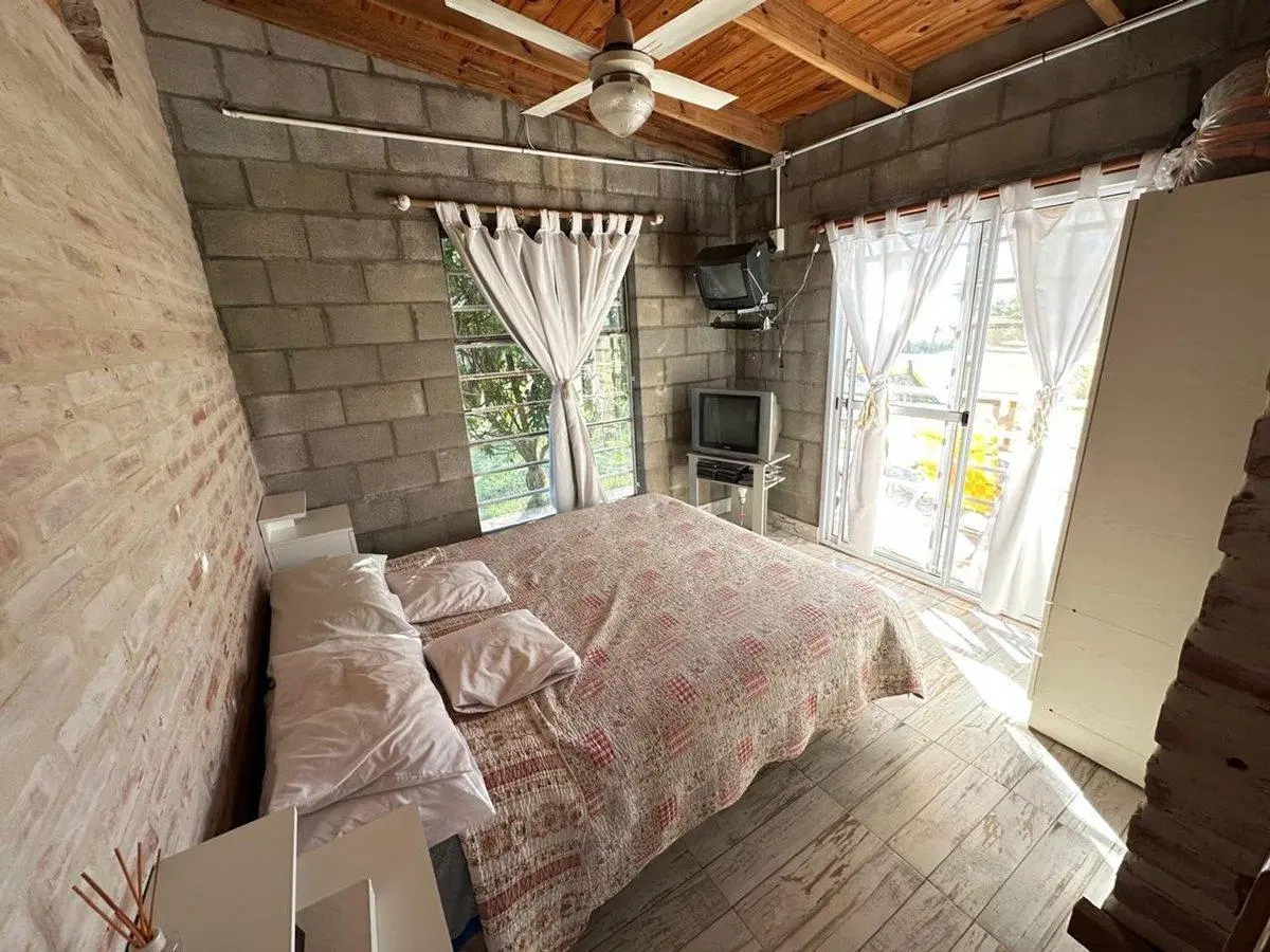 VENTA CASA 2 AMBIENTES C/ PARQUE Y PILETA EN MONTE 4