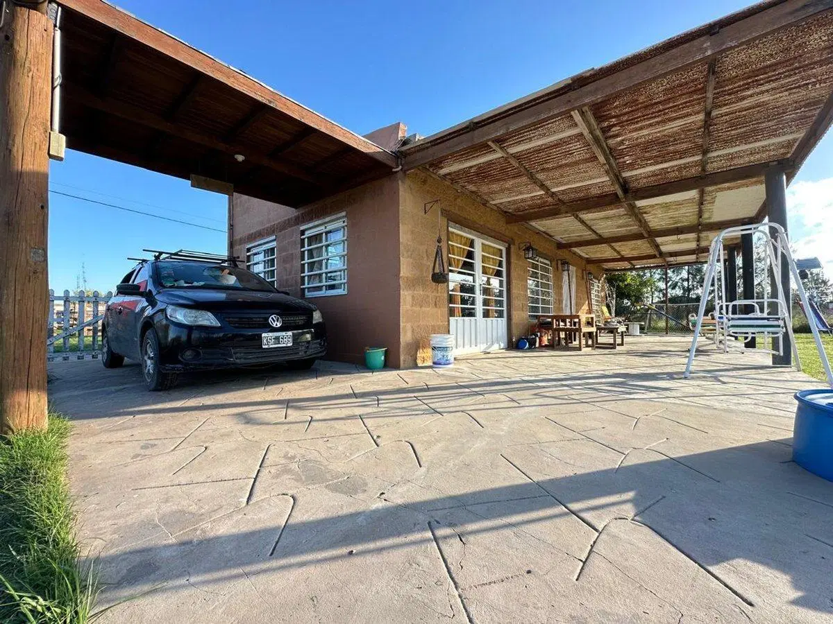 VENTA CASA 2 AMBIENTES C/ PARQUE Y PILETA EN MONTE 5