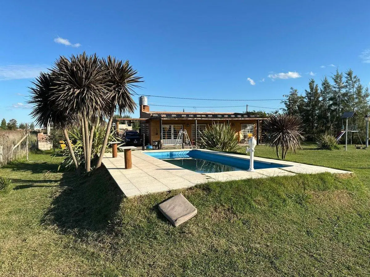 VENTA CASA 2 AMBIENTES C/ PARQUE Y PILETA EN MONTE 4