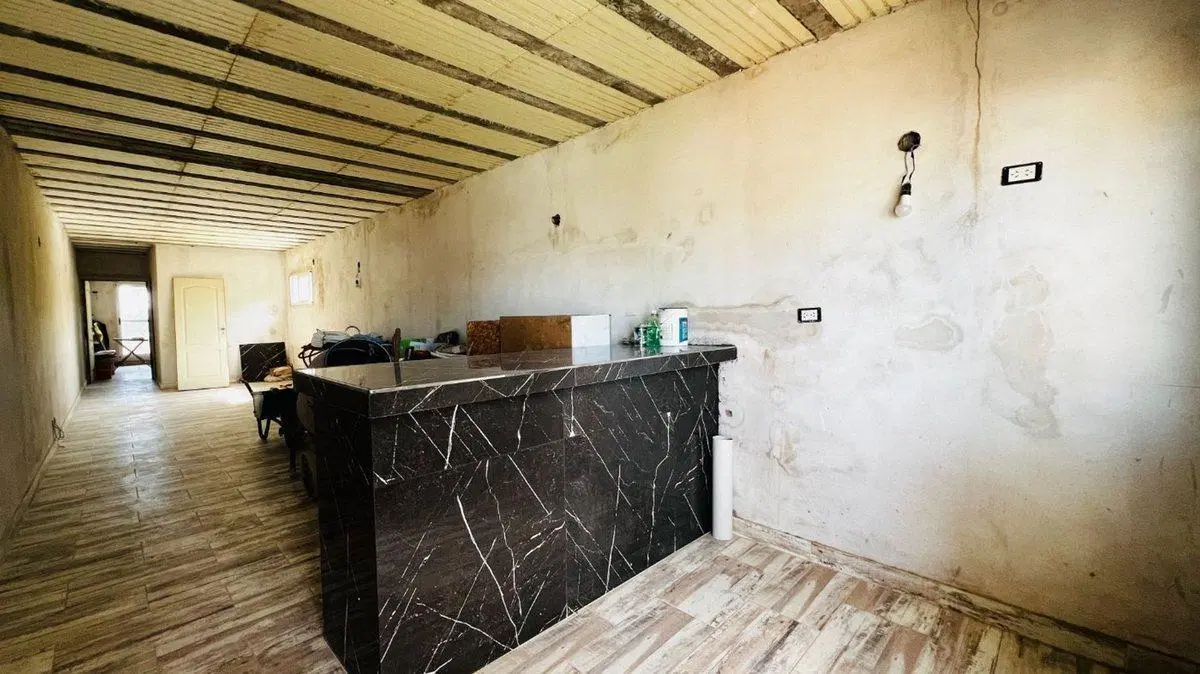 LOTE EN VENTA BANFIELD CON 132 MTS CONSTRUIDOS 4