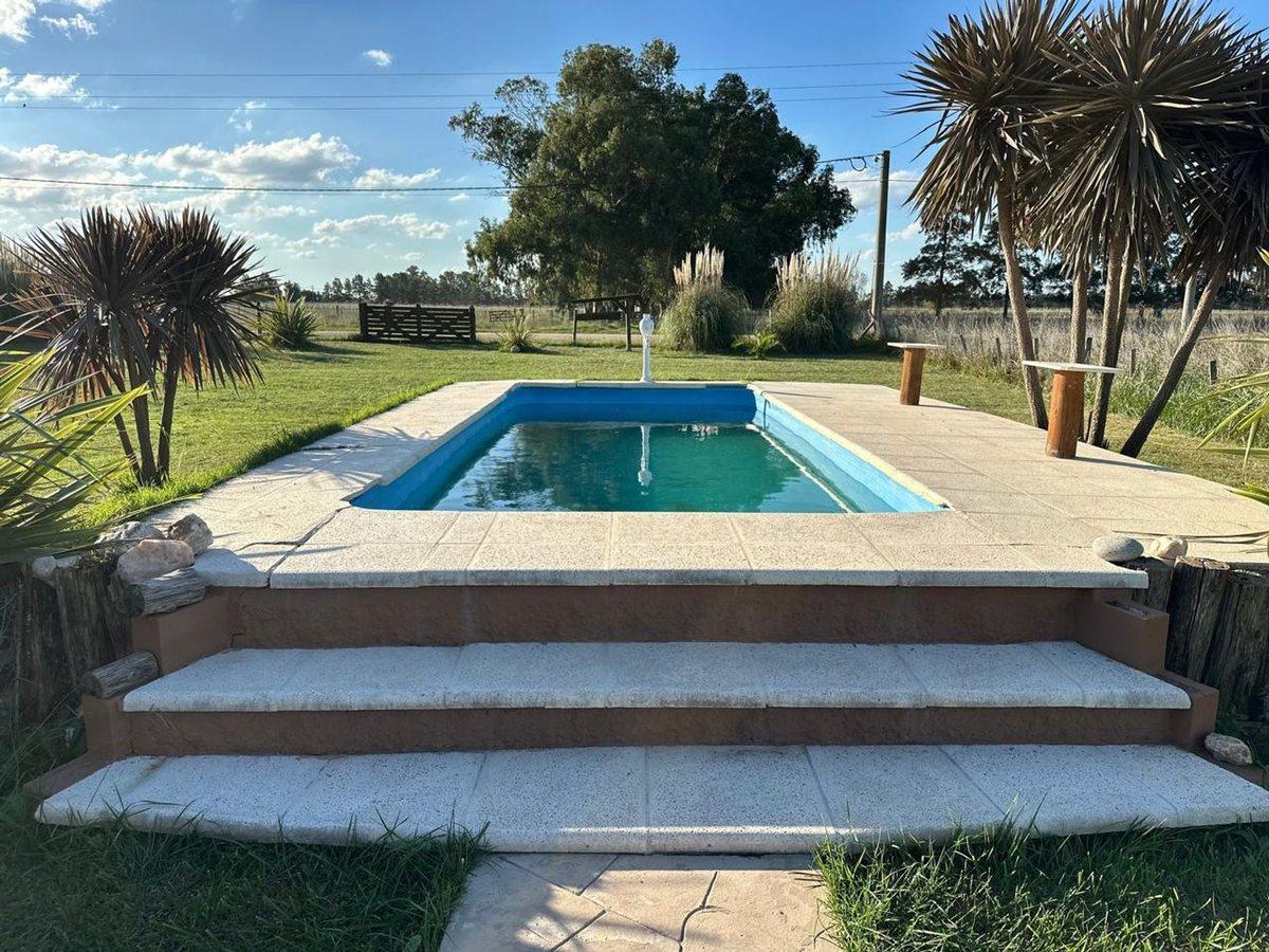 Foto de VENTA CASA 2 AMBIENTES C/ PARQUE Y PILETA EN MONTE, imagen 5