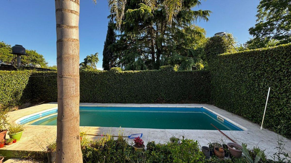 Foto de CASA 4 AMBIENTES VENTA PILETA LOCAL Y GARAJE, imagen 5