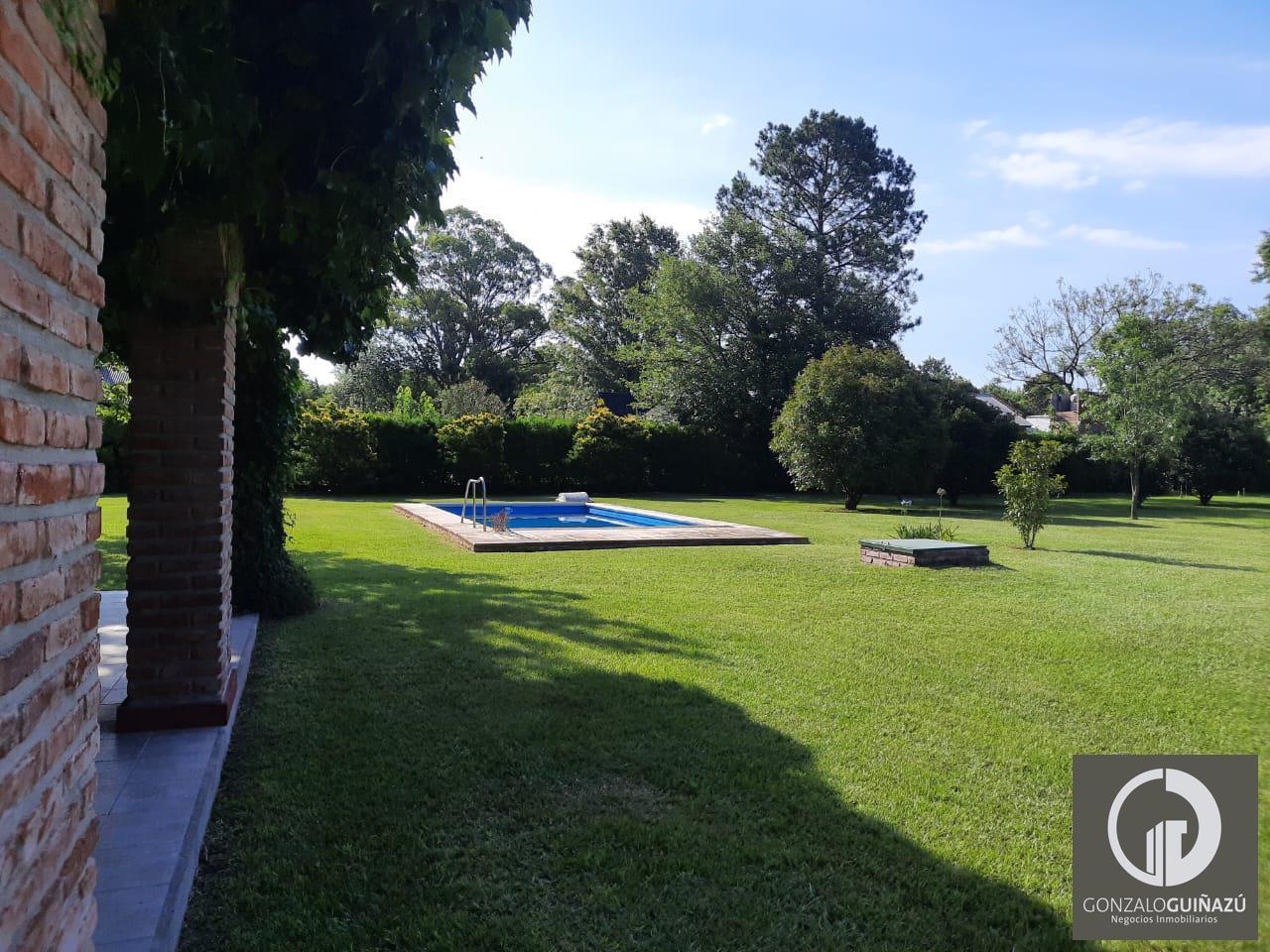 Foto de TERRENO VENTA 1.200 M2 CON PISCINA BARRIO LOS AROMOS ROLDAN, imagen 2