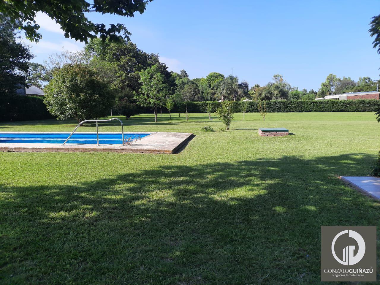 Foto de TERRENO VENTA 1.200 M2 CON PISCINA BARRIO LOS AROMOS ROLDAN, imagen 3