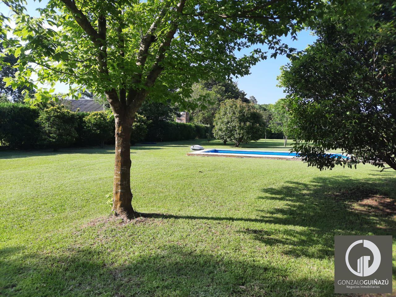 Foto de TERRENO VENTA 1.200 M2 CON PISCINA BARRIO LOS AROMOS ROLDAN, imagen 1