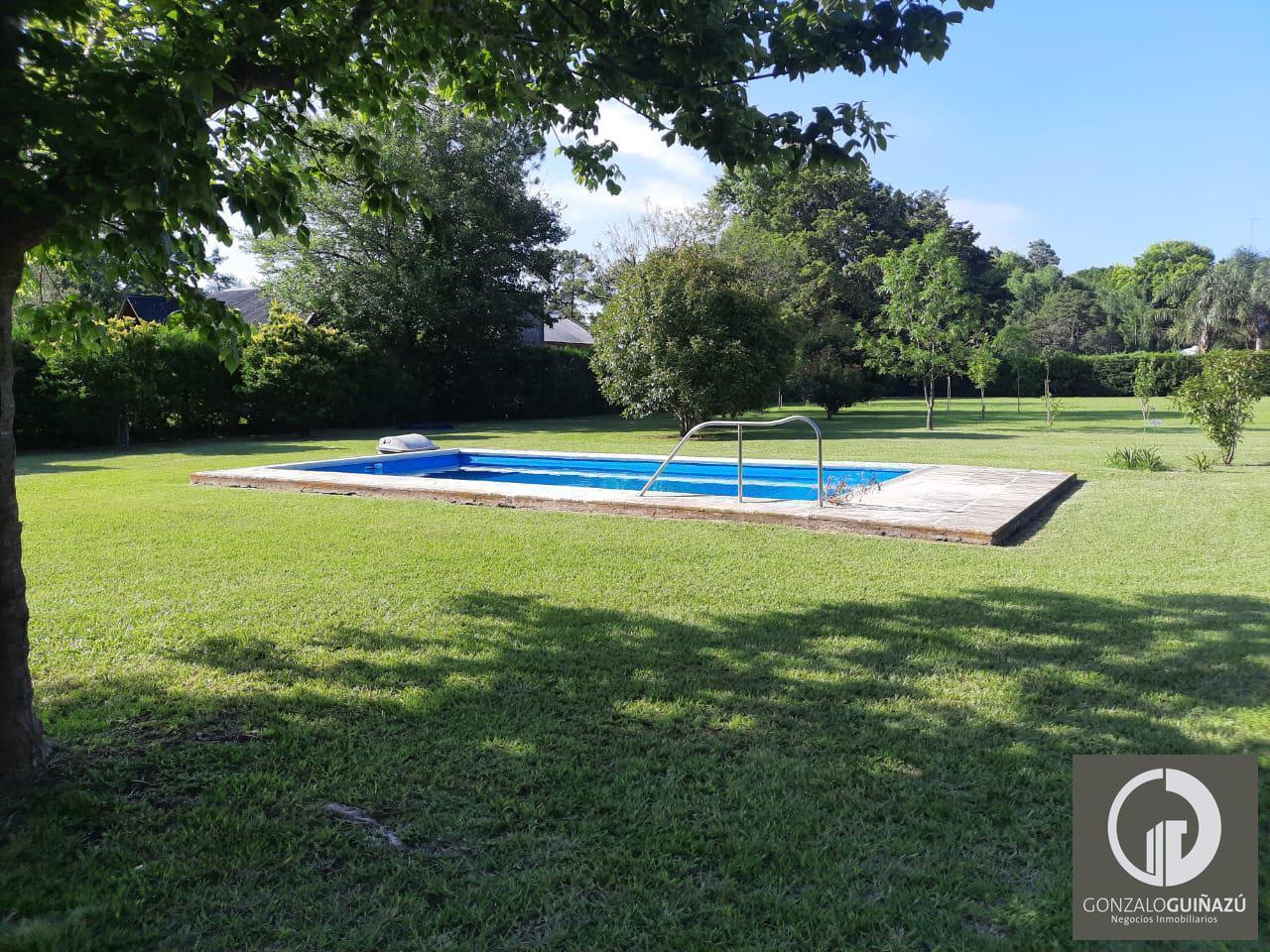 Foto de TERRENO VENTA 1.200 M2 CON PISCINA BARRIO LOS AROMOS ROLDAN, imagen 4