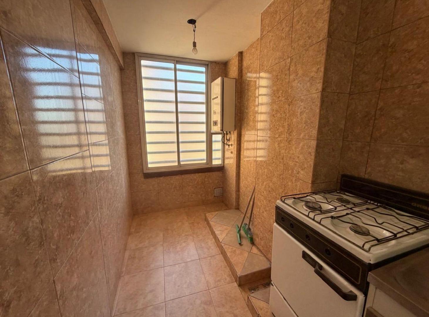 Foto de Venta Dpto 2 amb. con jardín y cochera en Lugano, imagen 1