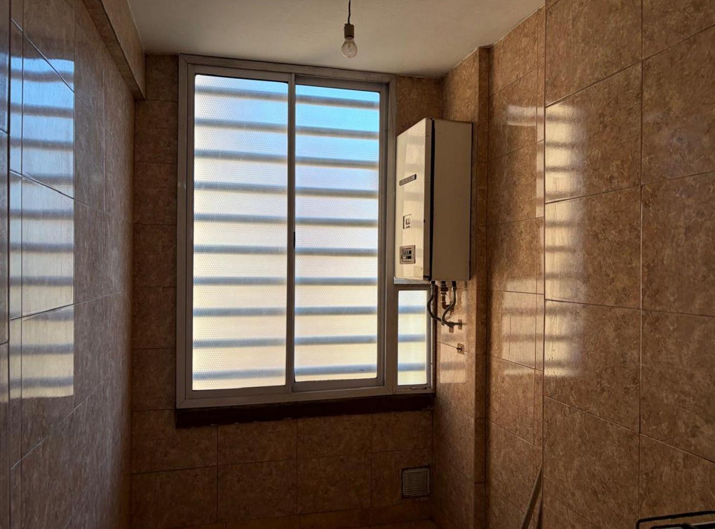 Foto de Venta Dpto 2 amb. con jardín y cochera en Lugano, imagen 5