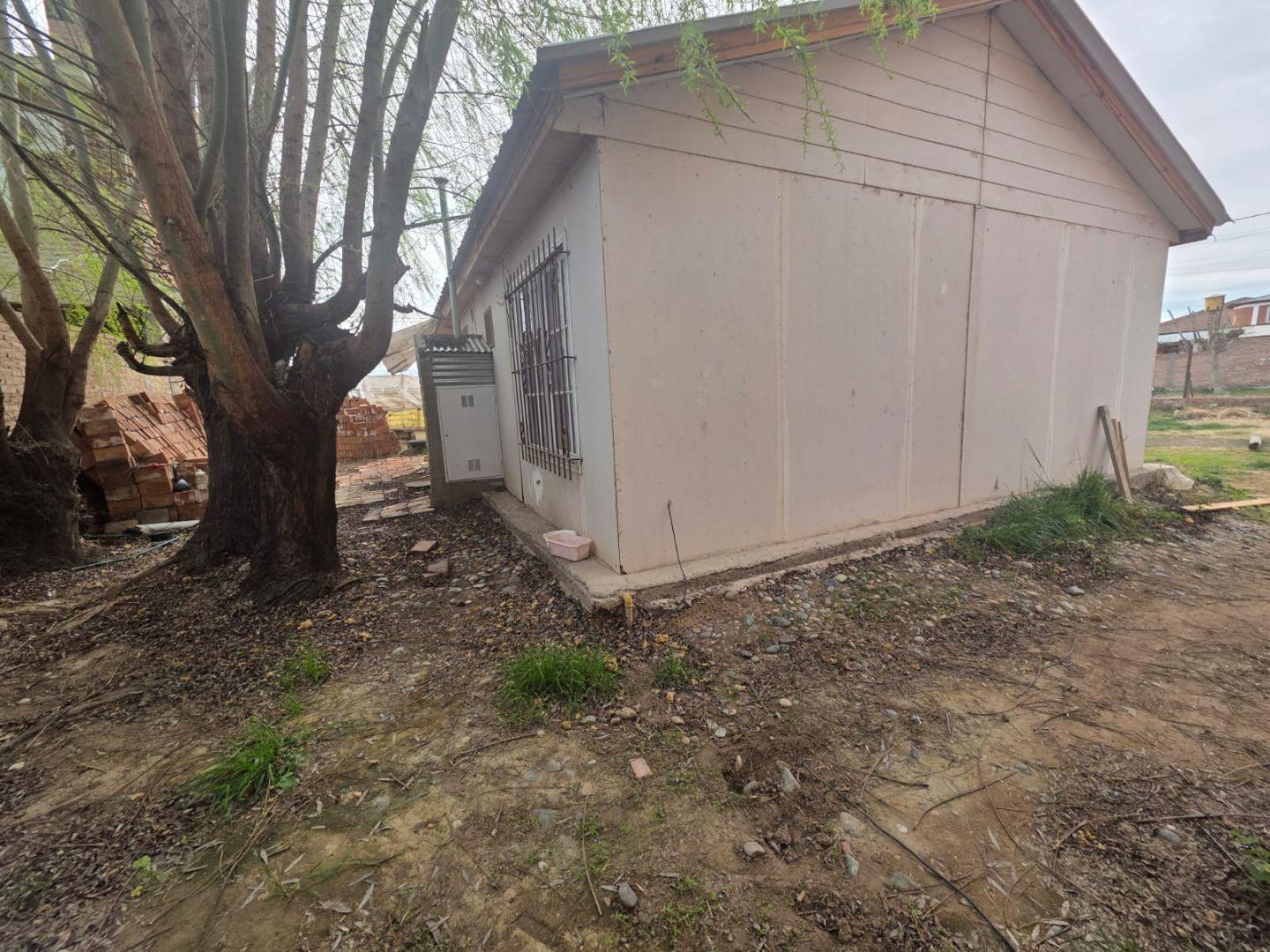 Venta de Lote con Casa Prefabricada en Plottier