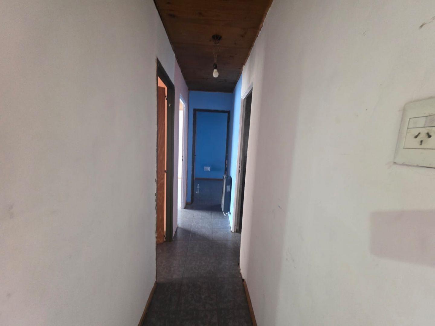 Foto de Venta de Lote con Casa Prefabricada en Plottier, imagen 1
