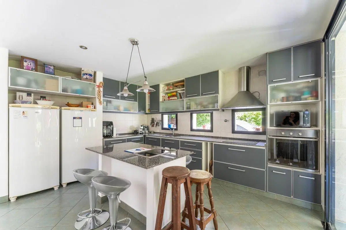 VENTA . CASA - 5 AMB. B°. SANTA CLARA - TIGRE 5
