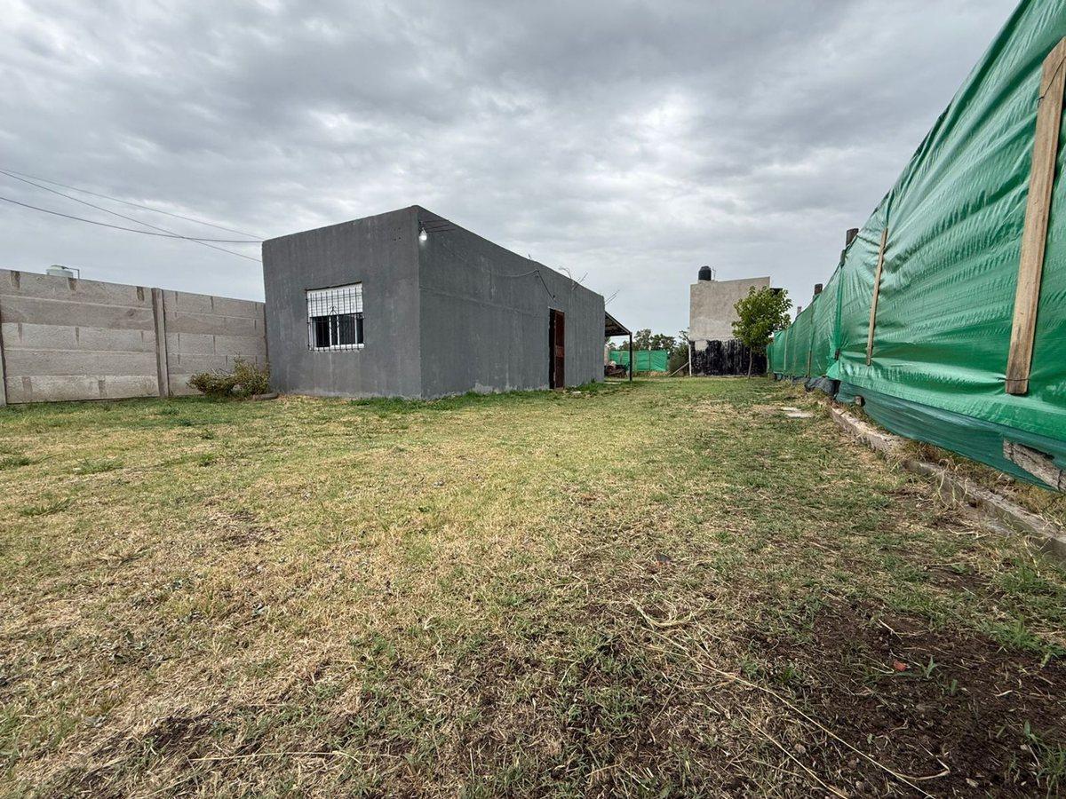 LOTE CON CASA, FERRARI, Bs. As. FINANCIA